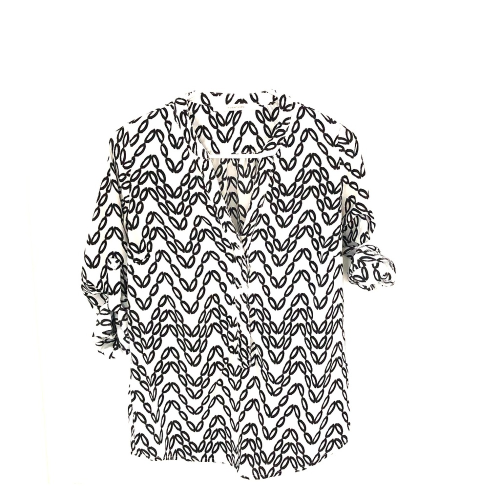 Black and white patterned blouse